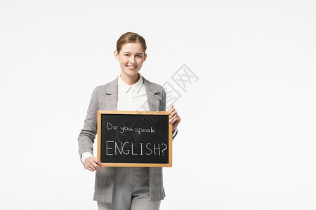 英语外教手举着小黑板背景图片