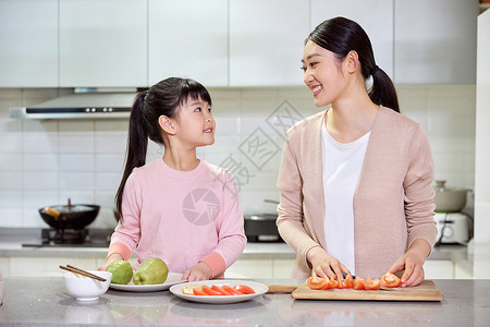 母女居家下厨切菜居家做饭背景图片