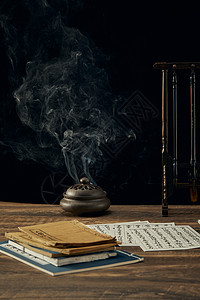 古代香炉黑色背景下香炉轻烟 毛笔笔架古书静态实物实拍背景