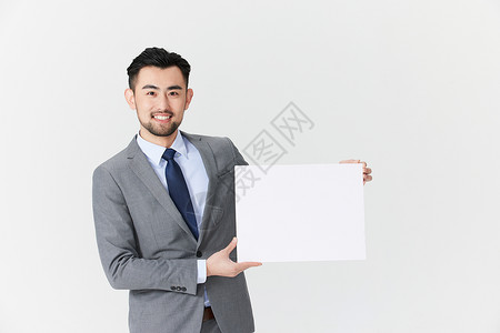 手持白板的成年男性图片