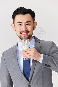 装水的杯子喜欢喝牛奶的商务男性背景