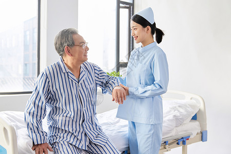 护士照顾行动不便的老人背景图片