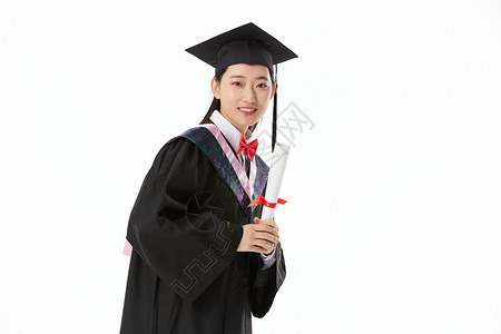 手拿毕业证的女大学毕业生图片