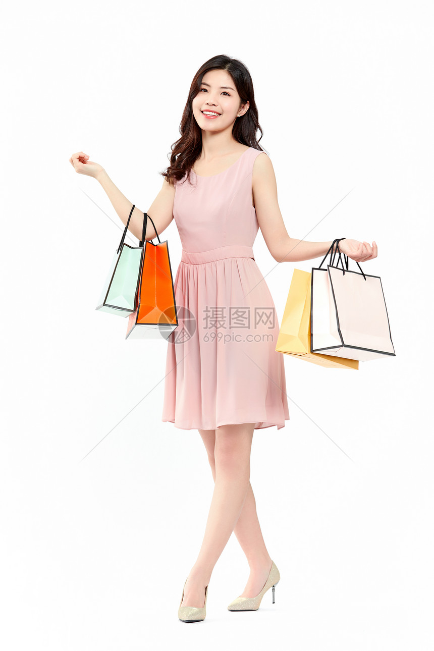 时尚购物女性拎购物袋图片
