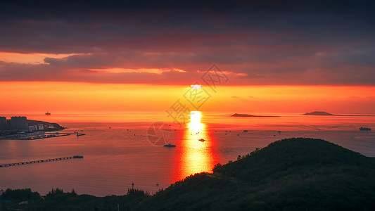 海南三亚鹿回头景区夕阳落日背景