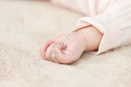 宝宝百日照可爱的婴儿小宝宝手部特写背景