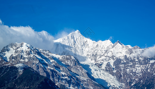 纳梅里云南迪庆梅里雪山山峰真容背景