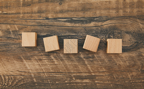 木块字你花纹木桌面上的积木加字素材背景