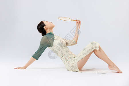 羽毛球拍元素古典东方旗袍美女舞蹈舞者背景