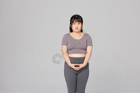 不开心的肥胖女性形象图片