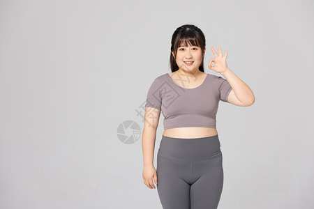 重量标志肥胖女性OK形象背景