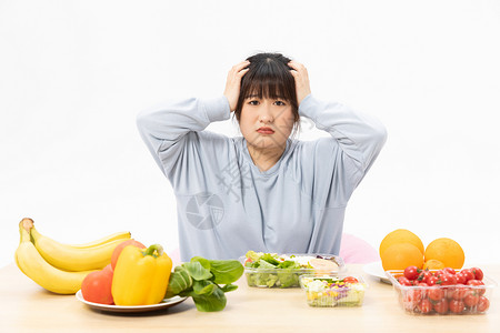 讨厌的人讨厌吃水果蔬菜的肥胖女性背景