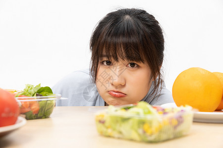 讨厌吃蔬菜的肥胖女性图片