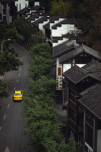 重庆出租车与江南建筑背景图片