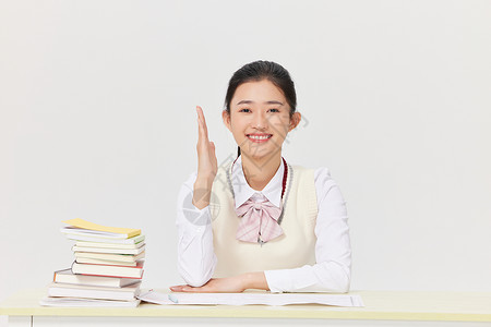 期末冲刺女学生上课举手发言背景