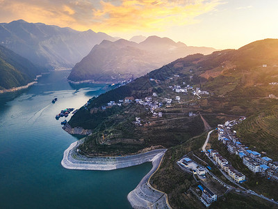 创意光辉长江三峡重镇巴东三峡巫峡日落光辉航拍背景