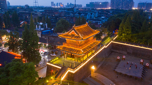 荆州锅盔湖北荆州古城夜景背景