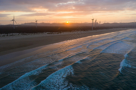 粤澳夕阳下的海滩背景