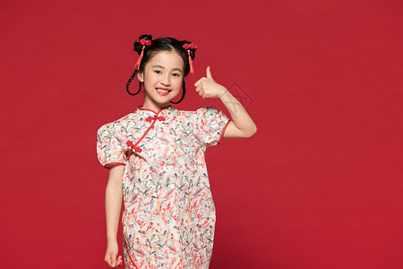 小女孩写真红色背景中国风旗袍儿童点赞背景