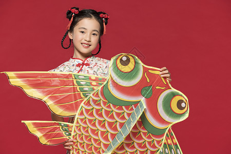 汉服小孩女孩拿着中国传统文化风筝背景