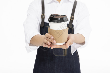 咖啡奶茶店饮品女性服务员递出咖啡特写背景