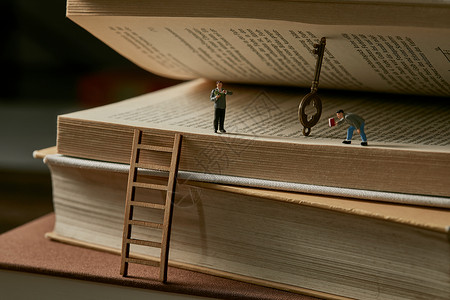 书本梯子世界读书日创意微观小人背景
