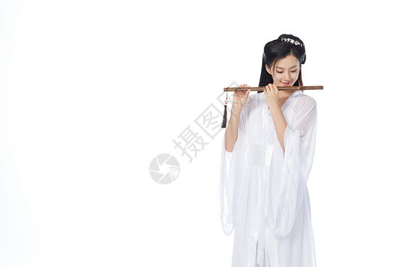 中国风古装美女吹笛子背景图片