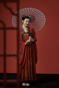 唐朝人物古装唐朝服饰美女撑着纸伞背景