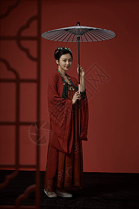 古装唐朝服饰美女撑着纸伞图片