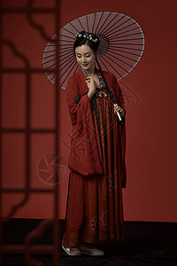 唐朝服装古装唐朝服饰美女撑着伞背景