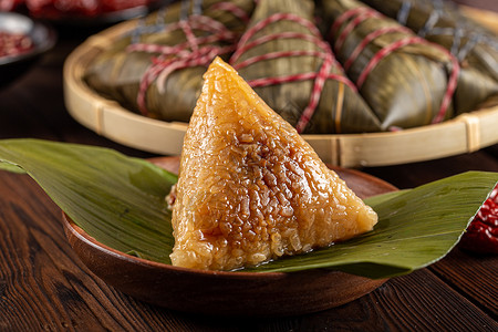 手绘蜜枣粽子端午节美味的粽子背景