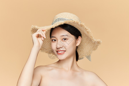 夏日美女戴草帽面部肌肤展示高清图片