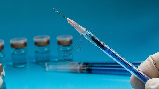 疫情抗疫疫苗背景图片