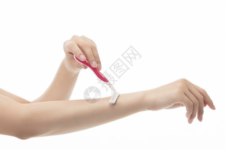 健康护肤女性手部刮毛特写高清图片