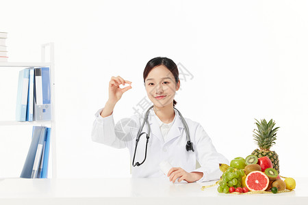 青年女性营养师形象青年女性营养师展示药品背景
