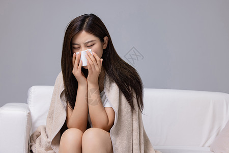 预防流感感冒居家休息的女生背景