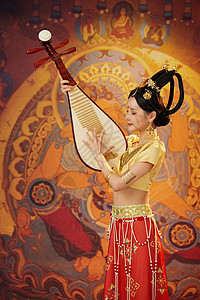 敦煌壁画飞天仙女宣传海报手拿琵琶舞蹈的西域美女背景