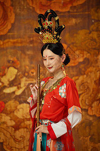 中国风手机海报手拿笛子的西域舞女背景