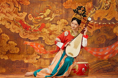 中国风古典壁画弹奏琵琶的西域飞天乐姬背景