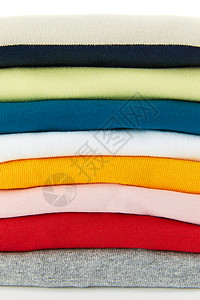 整齐堆叠的多色短袖上衣多色纯棉短袖堆叠面料细节背景
