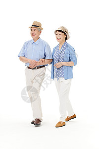 老年夫妻挽着手走路图片