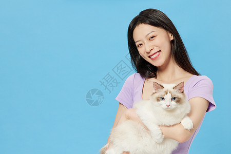 猫与人青年女性与宠物猫咪背景