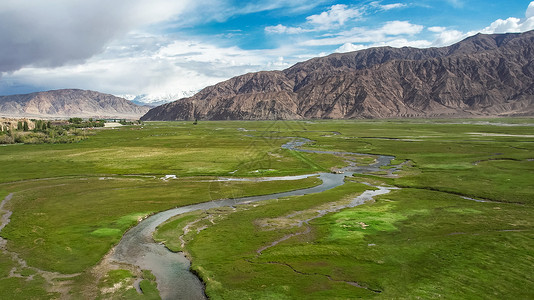 帕米尔山脉航拍5A新疆帕米尔旅游景区景点金草滩背景