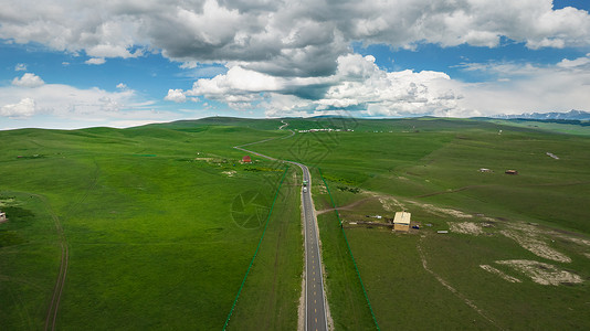 5A航拍夏季蓝天白云下的喀拉峻大草原背景图片