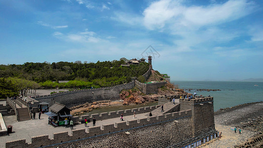 航拍5A景区山东蓬莱阁景区城墙古炮台高清图片