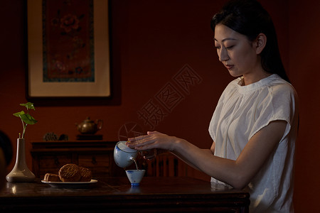 女性品茶背景图片