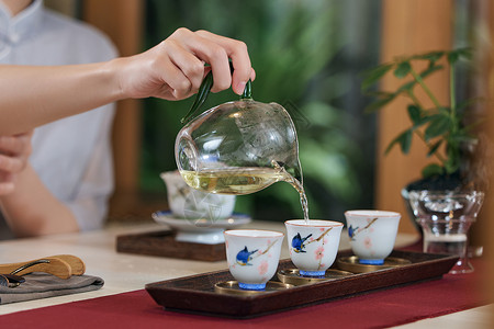 茶艺女女茶艺师沏茶特写背景