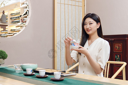 气质美女茶室品茶高清图片