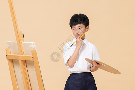 学习绘画遇到瓶颈的小男孩背景图片