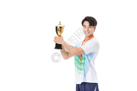 手握奖杯的运动员形象背景图片